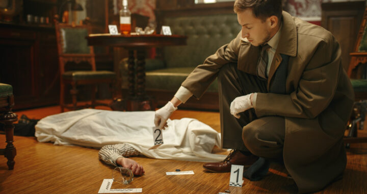 male-detective-gloves-looking-evidence-crime-scene